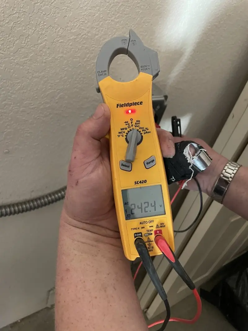 Voltage testing with clamp meter during Hot Tub / Pool Electrical Wiring in Bryan